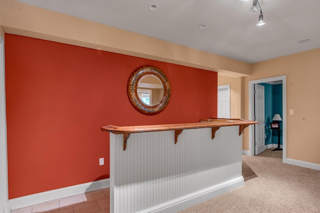 hallway with light carpet