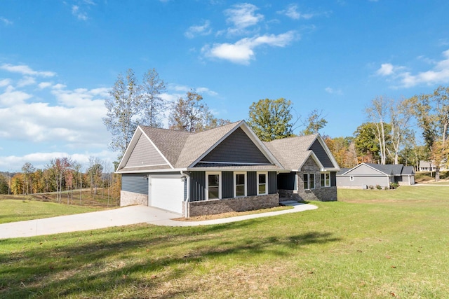 craftsman-style home with a front yard and a garage