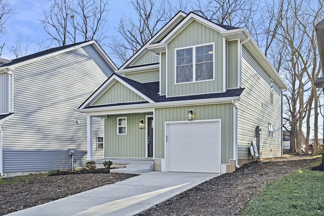 view of front of property with a garage