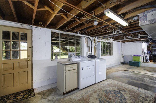 basement with plenty of natural light and separate washer and dryer