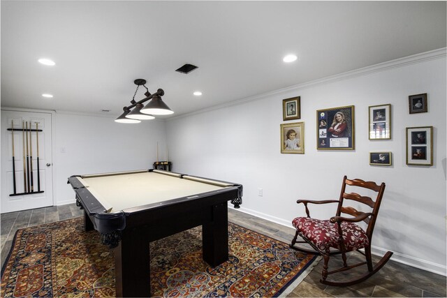 game room featuring dark wood-type flooring, crown molding, and billiards