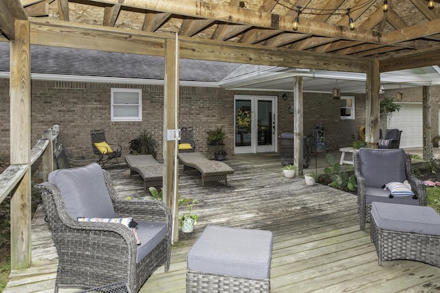 wooden deck featuring french doors