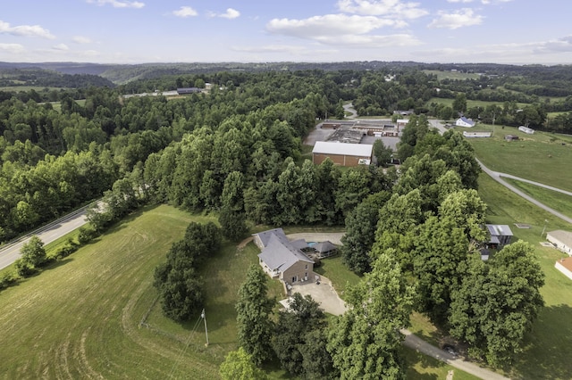 birds eye view of property with a rural view