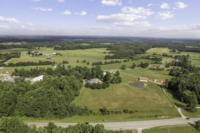 birds eye view of property featuring a rural view