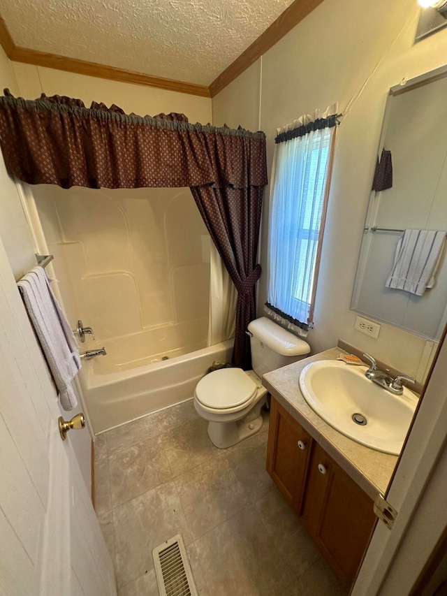 full bathroom featuring tile patterned flooring, shower / bath combination with curtain, a textured ceiling, toilet, and vanity