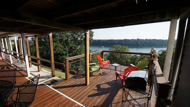 deck featuring a water view