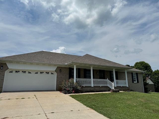 ranch-style home with a garage, a porch, and a front lawn