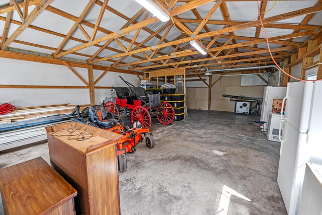 garage featuring white refrigerator