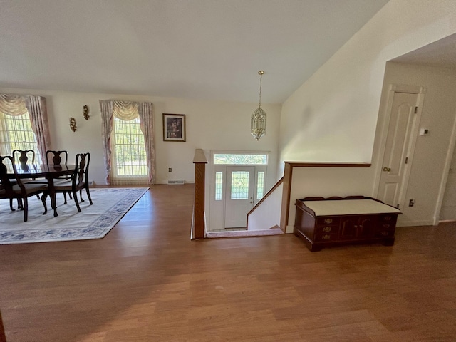 entrance foyer featuring a chandelier and hardwood / wood-style flooring