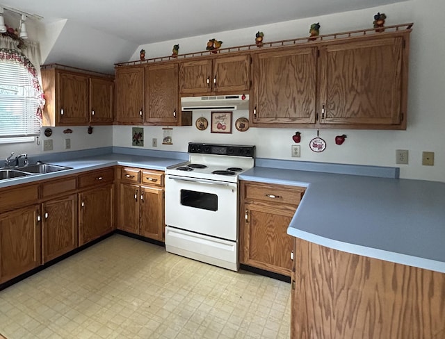 kitchen with sink, white range with electric cooktop, and vaulted ceiling