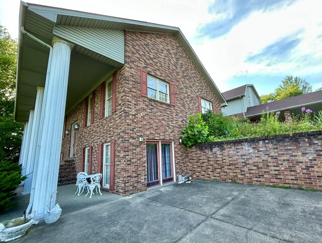 back of house featuring a patio