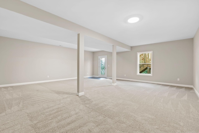 basement with light carpet