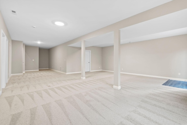 basement with light colored carpet