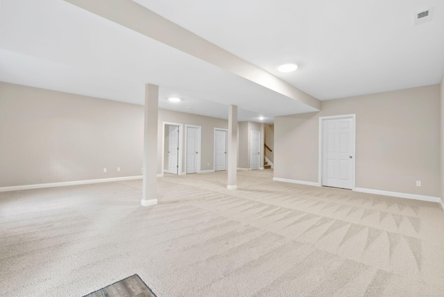 basement with light colored carpet