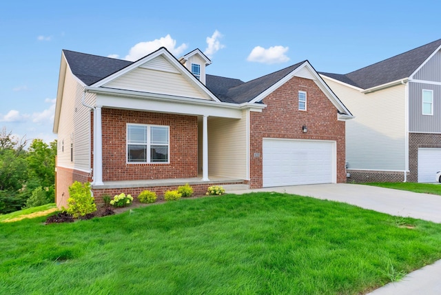 view of front of home with a front lawn and a garage