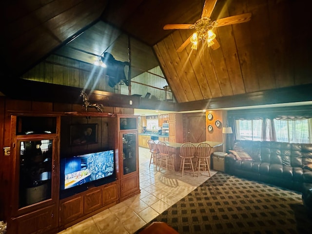 tiled living room with high vaulted ceiling, wood ceiling, and ceiling fan