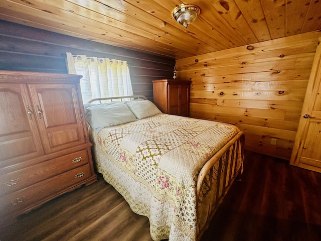 bedroom featuring dark hardwood / wood-style floors, wooden ceiling, and wood walls