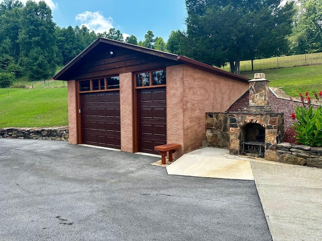 garage with a yard