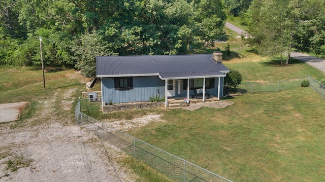 exterior space featuring a porch and a front lawn