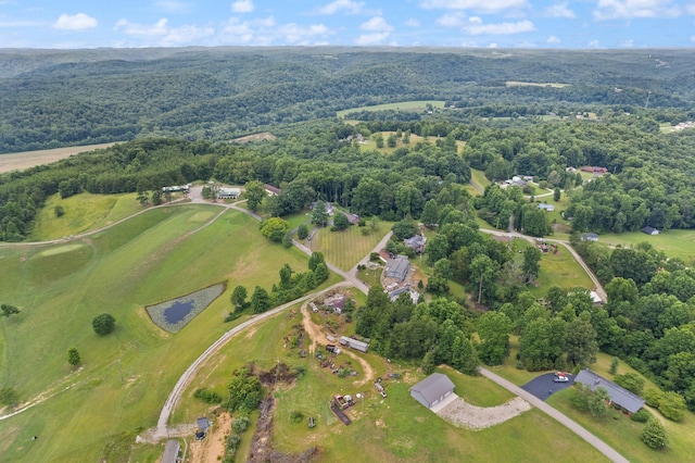 aerial view featuring a forest view