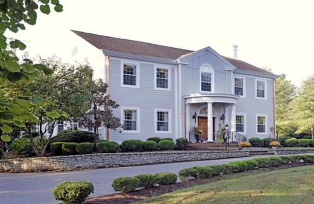 view of colonial home