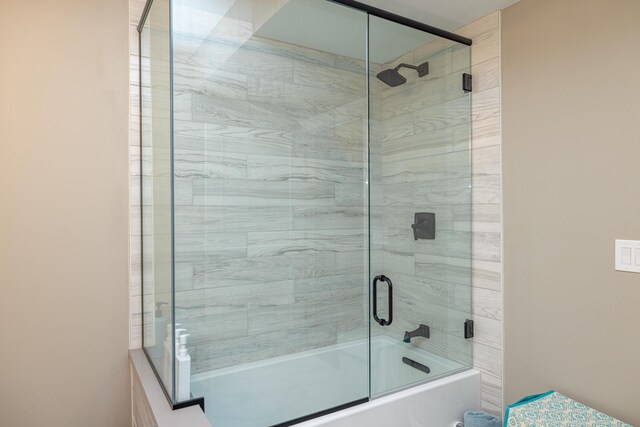 bathroom featuring enclosed tub / shower combo