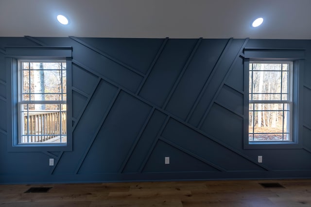 interior details featuring wood-type flooring