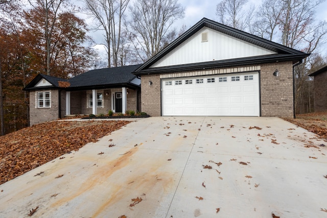 single story home featuring a garage