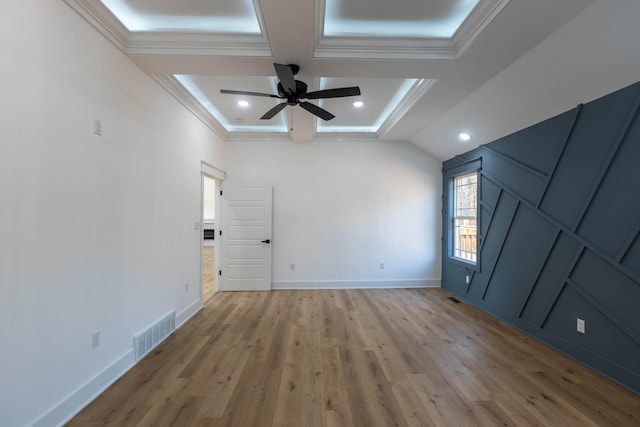 interior space with crown molding, light wood-type flooring, and ceiling fan