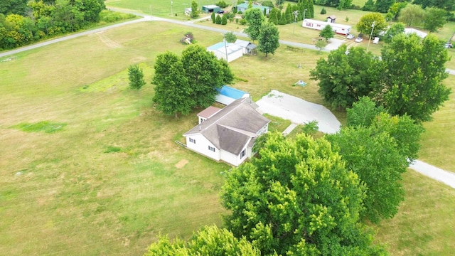 birds eye view of property with a rural view