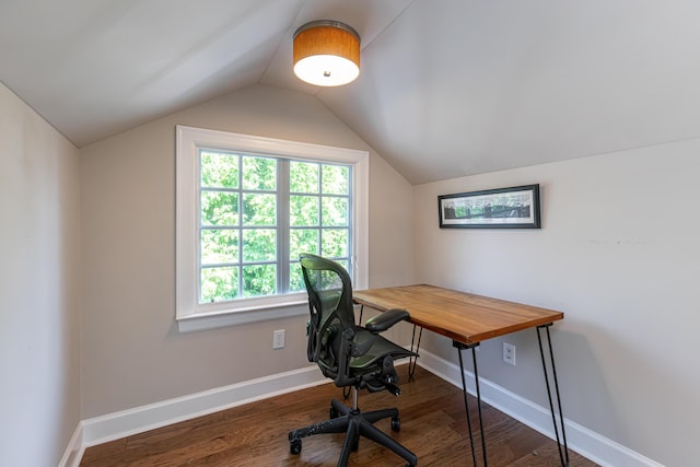 office space featuring baseboards, wood finished floors, and lofted ceiling