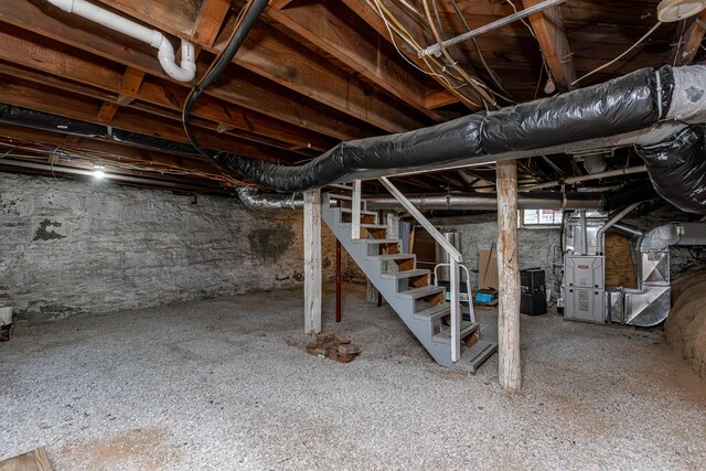 basement featuring heating unit