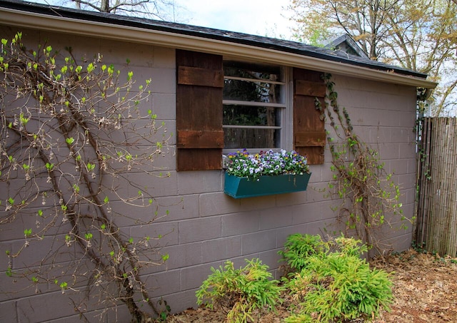 view of property exterior with fence