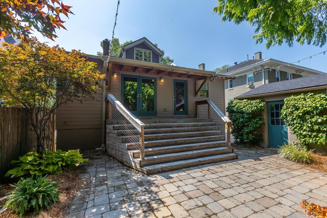 view of front of house with a patio area