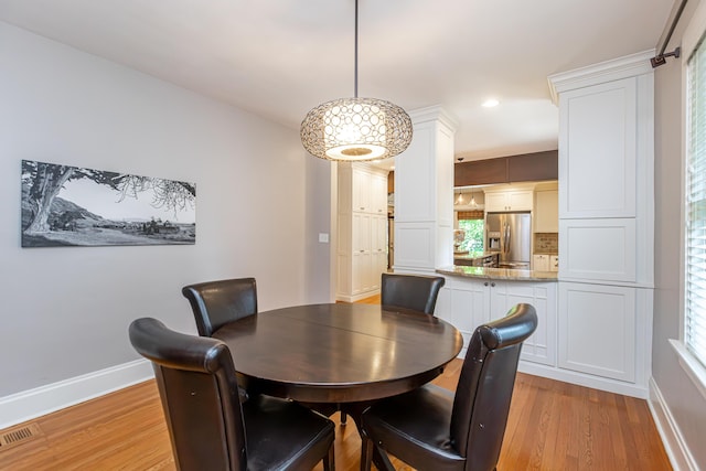 dining area with baseboards, recessed lighting, light wood-style flooring, and visible vents