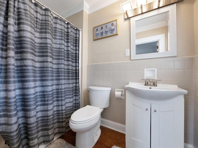 bathroom with tile walls, ornamental molding, hardwood / wood-style flooring, toilet, and vanity