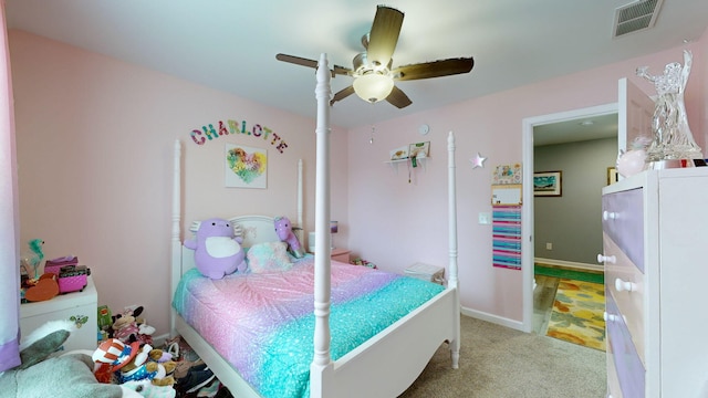 bedroom with light carpet and ceiling fan