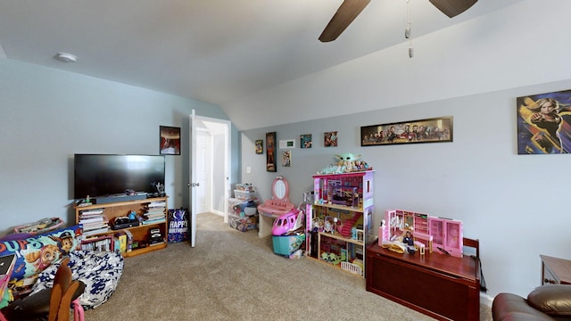 recreation room featuring carpet floors, lofted ceiling, and ceiling fan