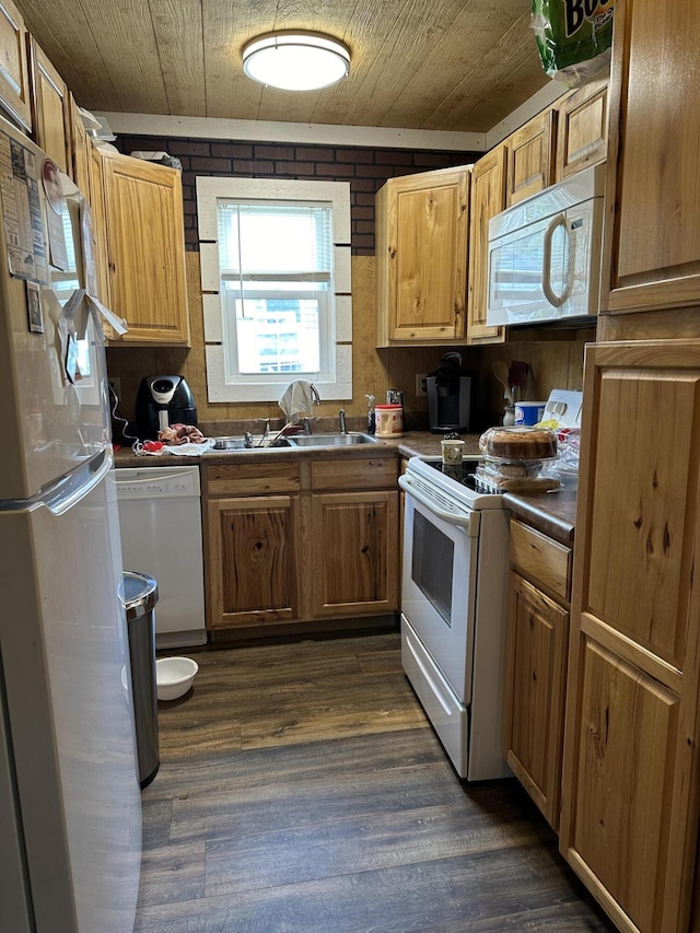 kitchen with dark wood-type flooring, brick wall, white appliances, and wooden ceiling