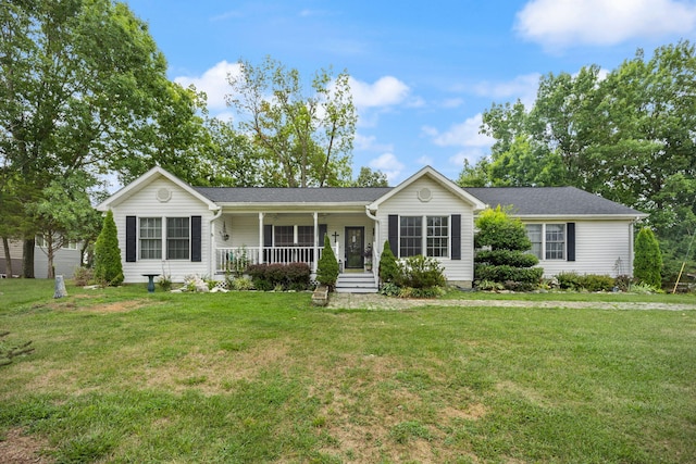 ranch-style house with covered porch and a front lawn