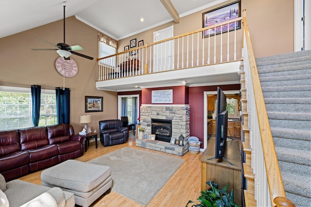 983 Short Town Rd, Liberty, KY 42539 - living area featuring stairs, ornamental molding, ceiling fan, a fireplace, and wood finished floors