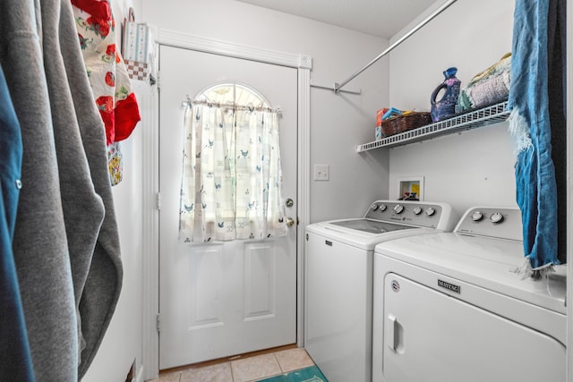 983 Short Town Rd, Liberty, KY 42539 - clothes washing area featuring light tile patterned floors, washer and dryer, and laundry area