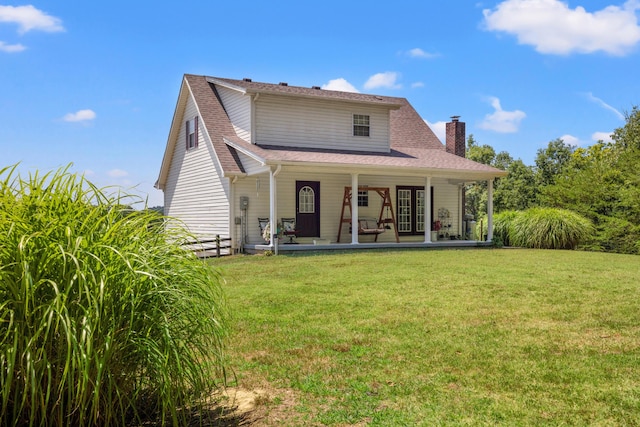983 Short Town Rd, Liberty, KY 42539 - back of house with a chimney, roof with shingles, fence, and a yard
