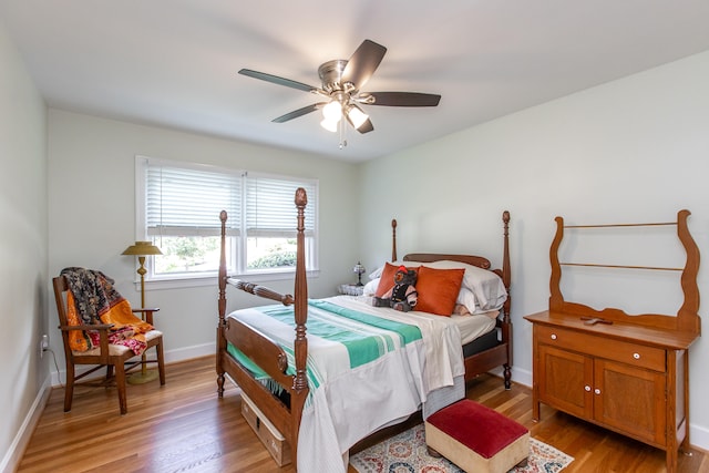 bedroom featuring ceiling fan and light hardwood / wood-style flooring