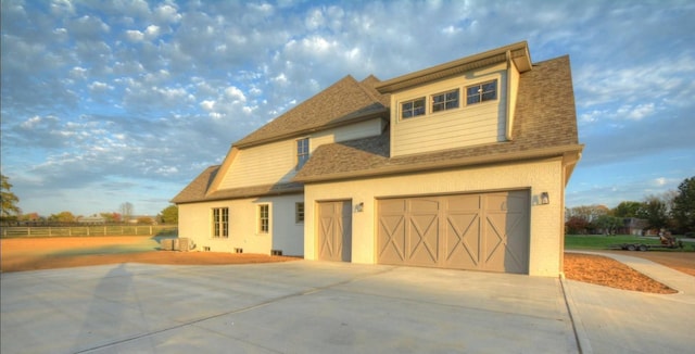 view of front of home featuring a garage