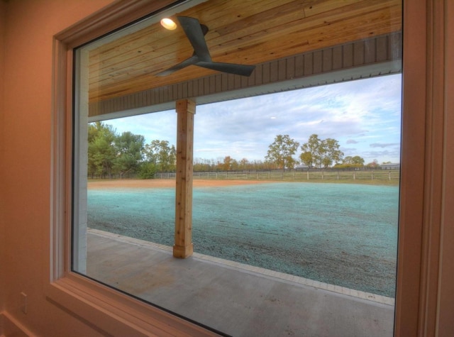 doorway to outside featuring wood ceiling, ceiling fan, and a healthy amount of sunlight