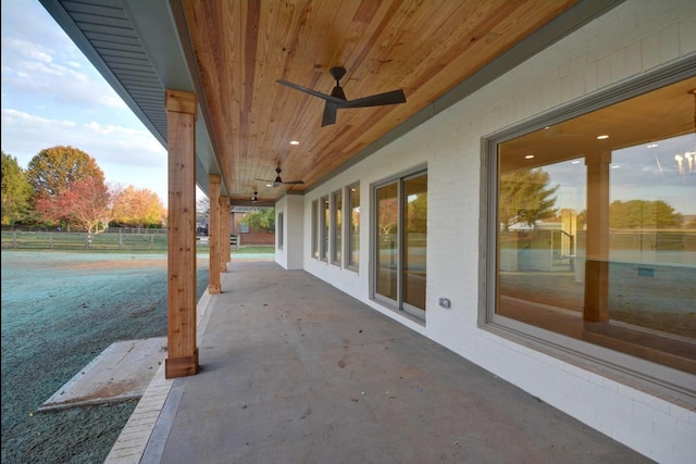 view of patio / terrace featuring ceiling fan