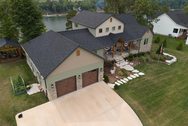 bird's eye view with a water view