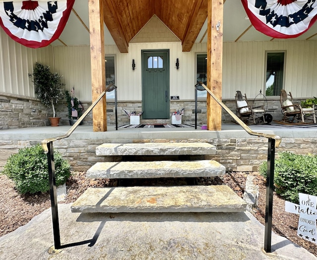 view of exterior entry with stone siding