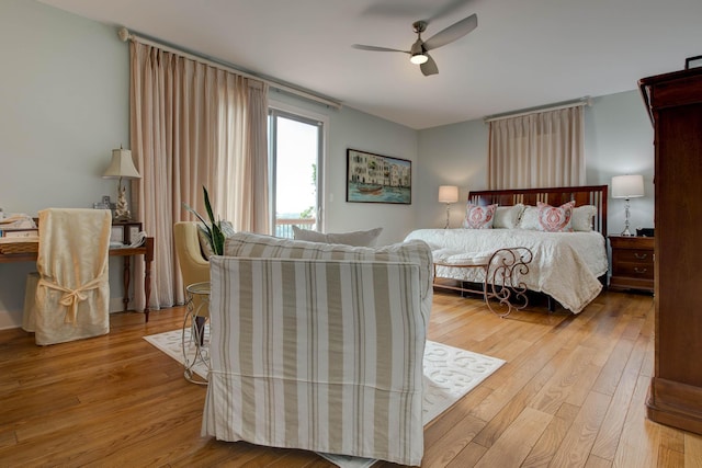 bedroom with hardwood / wood-style floors and ceiling fan